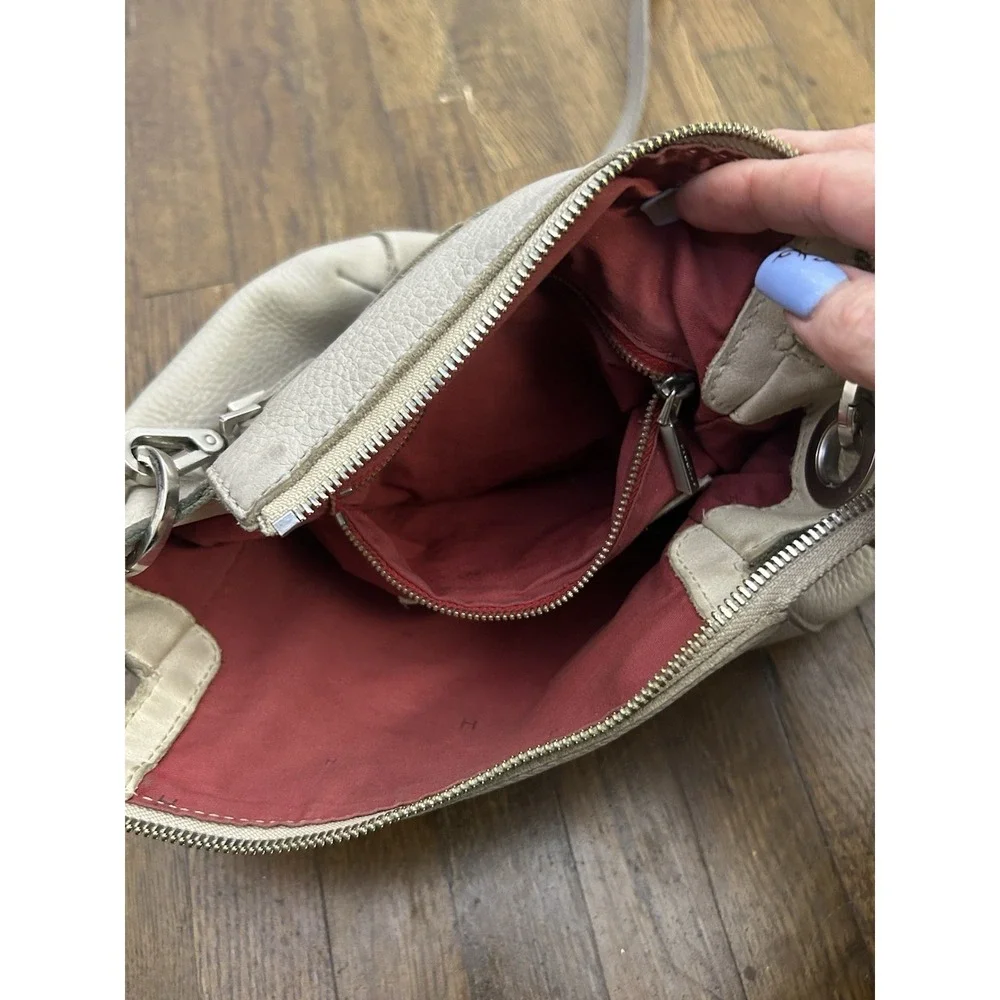Hammitt Bryant Medium bag is crafted from grey pebbled leather Silver Rivets Med